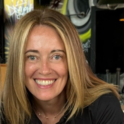 a woman smiling for the camera