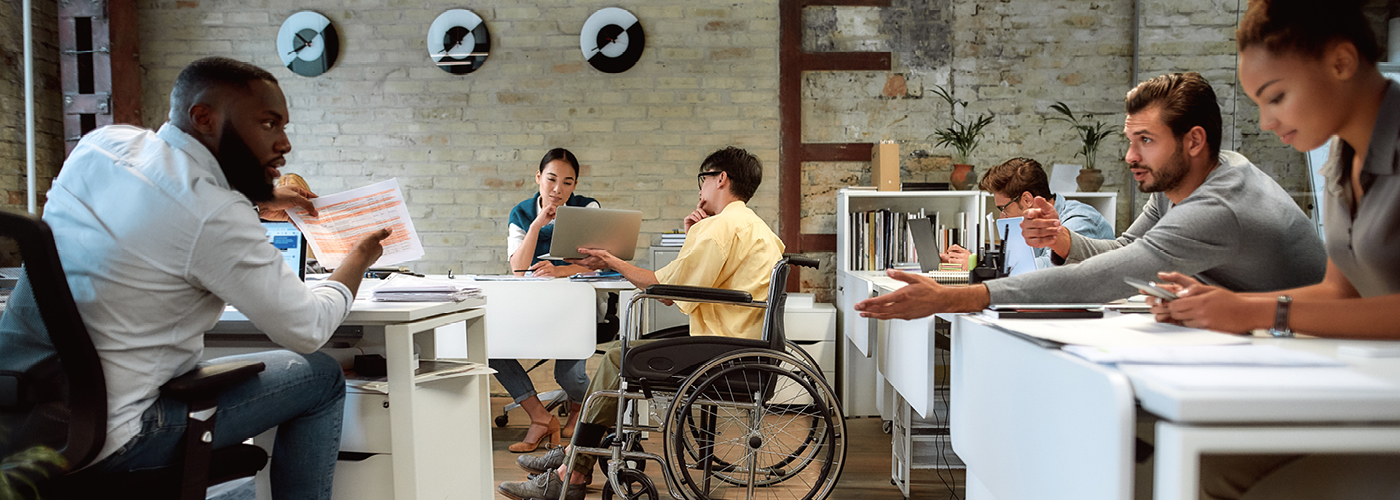 a group of people sitting around a table