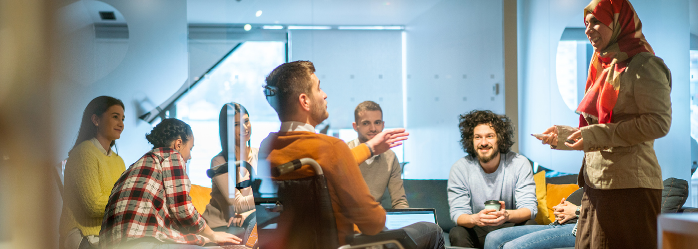 a group of people sitting in a room