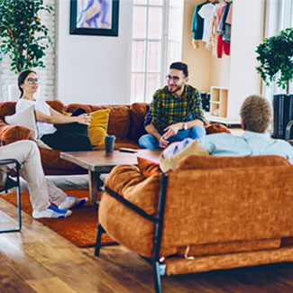 a group of people sitting on a couch