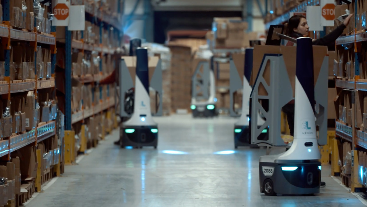 AI robots sort and package Assurant shipments